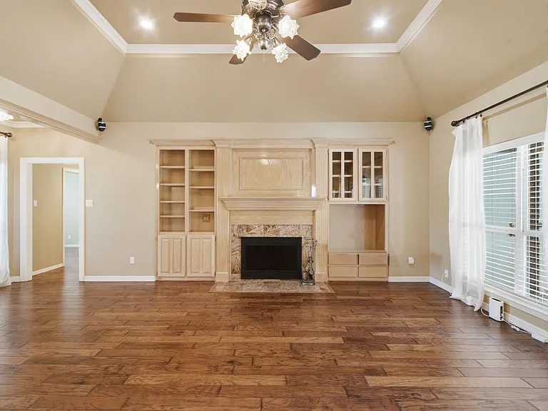 Brick Fireplace with Custom Built Ins