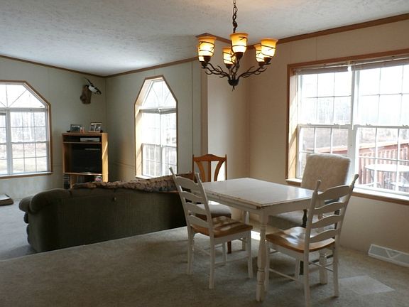 Check out the open floor plan looking from the dining room to the living room.