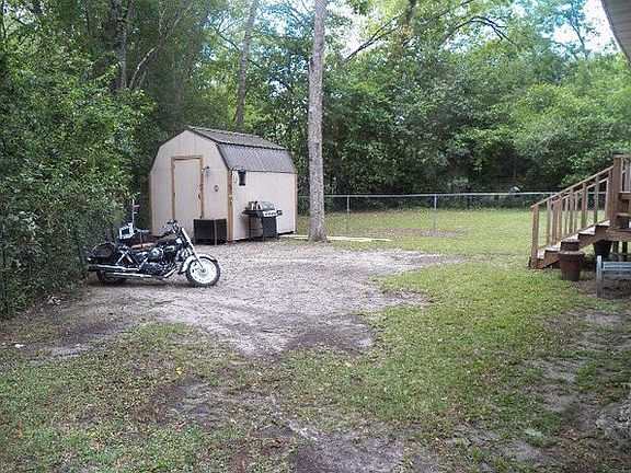 Back yard from carport side 