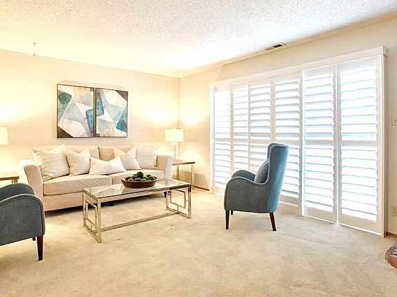 Spacious living room w/wood-burning stove