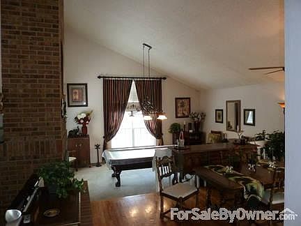 Dining room down to entertainment area