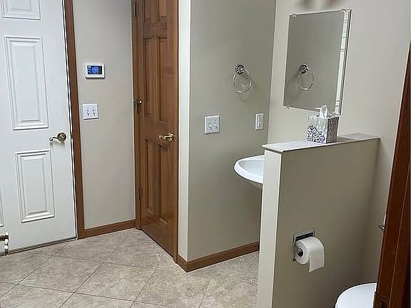 Half bath next to garage