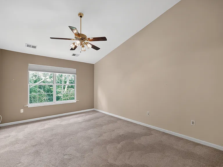 Master Bedroom showing vaulted ceilings (not shown: walk-in closet)