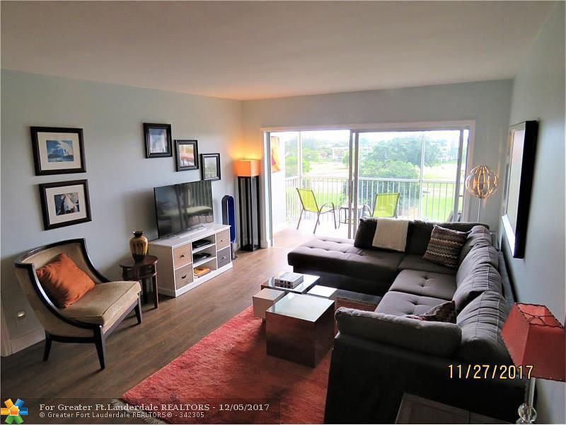 1st image of 3050 N Palm Aire Dr APT 706