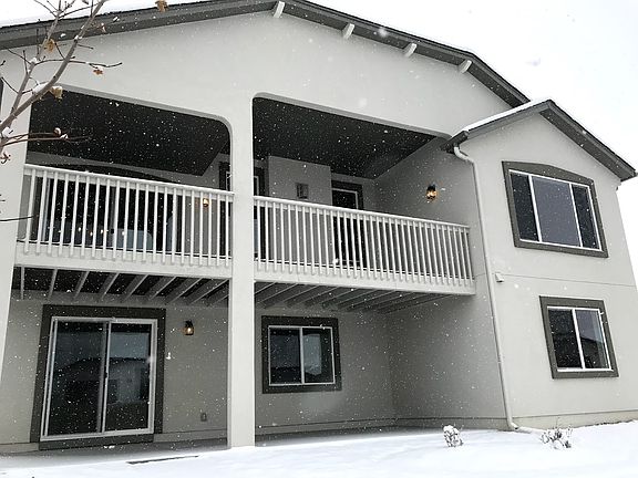 Walk-Out Rear Photo representing home to be built and may demonstrate optional features