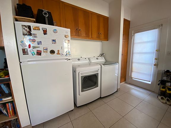Kitchen with new LG washer and dryer, and lots of kitchen storage space