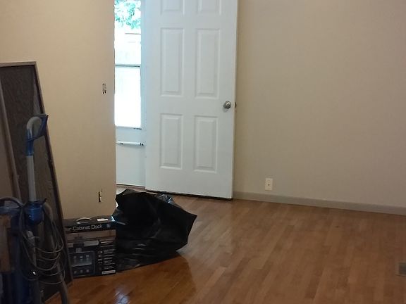 Dining Room next to kitchen and rear exit door to deck and b