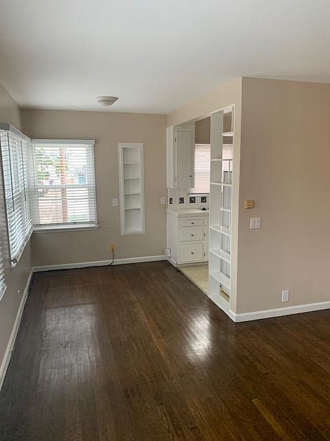 Current color of the unit is tan, before walls were yellow but shows the space well