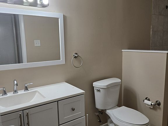 Hall bathroom with tub bath