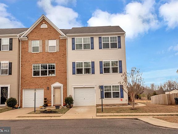 End Unit/2 assigned parking places plus garage