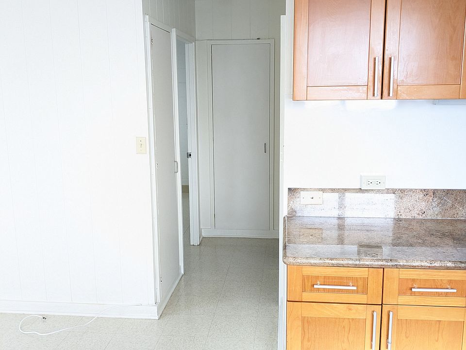 Hallway (bedroom #1 on left and bathroom and bedroom #2 on right)