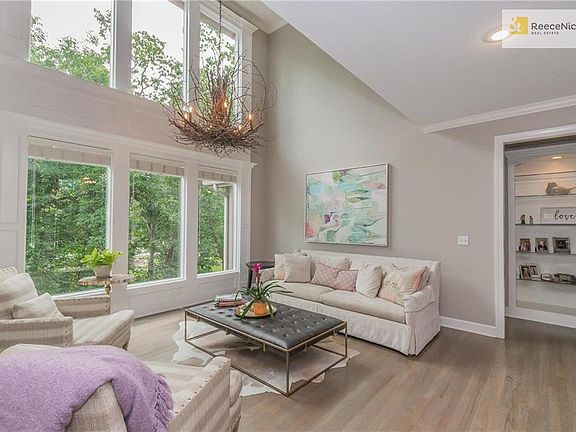 Formal Living Room - Wall of Windows for Views & Natural Lighting