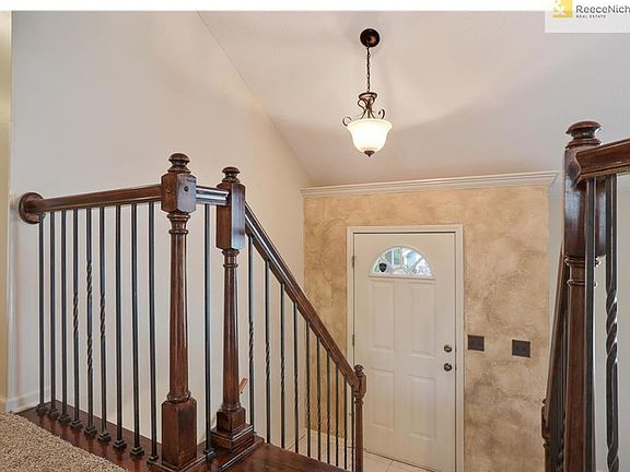 Banister features iron spindles