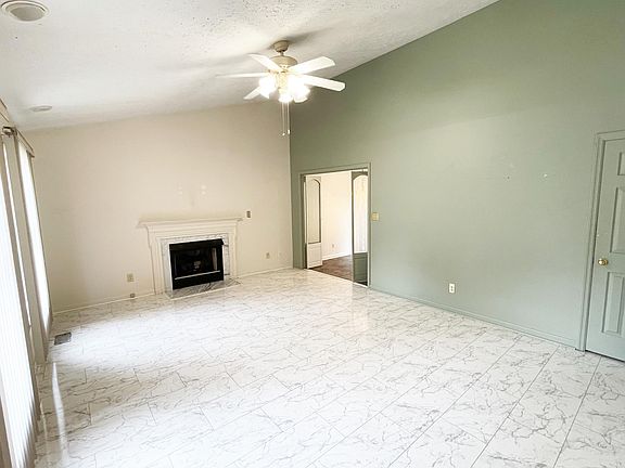 Living room with vaulted ceiling