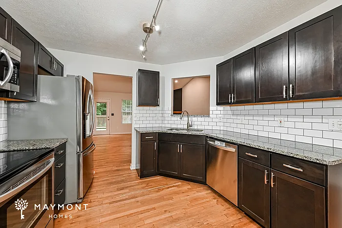 6231 Huntcliff Dr — Photo 8