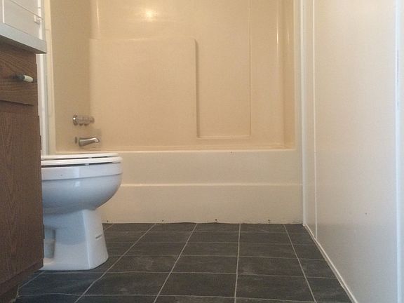 newly renovated bathrooms with new floor, toilets, paint sin