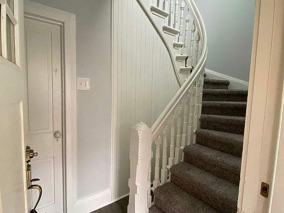 Entry/Foyer, apartment is a second floor apartment, small storage area in basement through the door that is closed