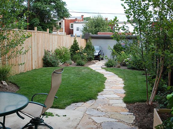Prof. Landscaped backyard
