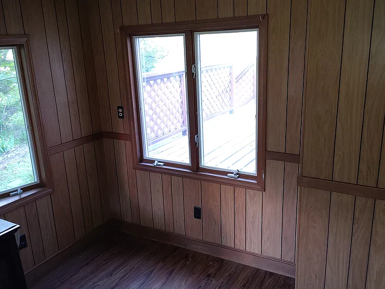 3-season enclosed porch room in back of house.