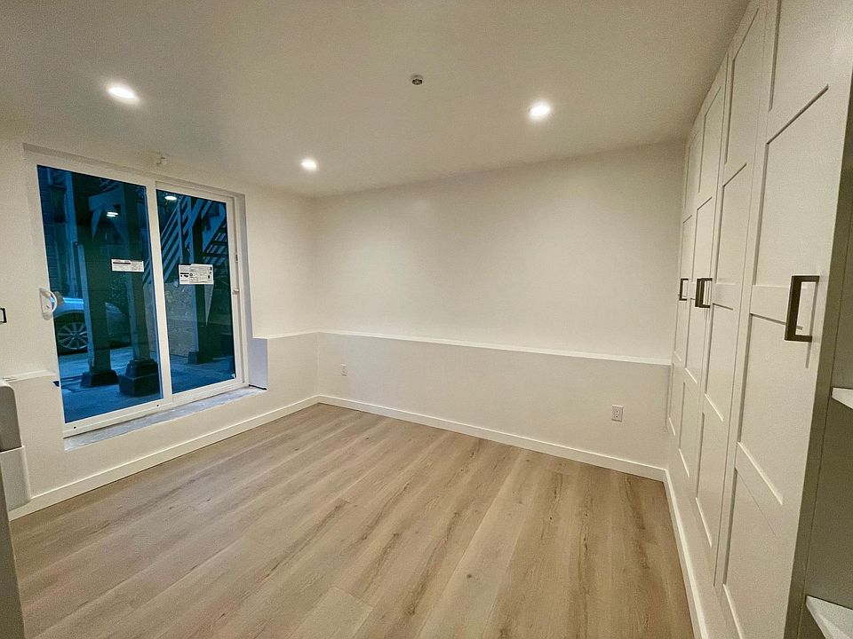 Bedroom with slider to yard
