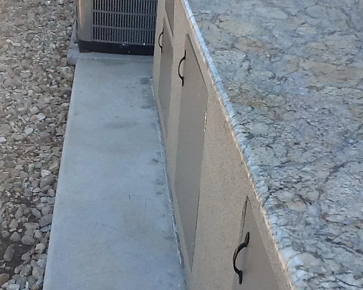 Back side patio, extra utility sink great for BBQ grill and space for dogs / cats to run safely.