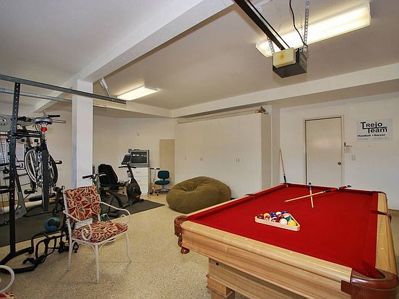 Extra-living space with room for a pool table and workout area!