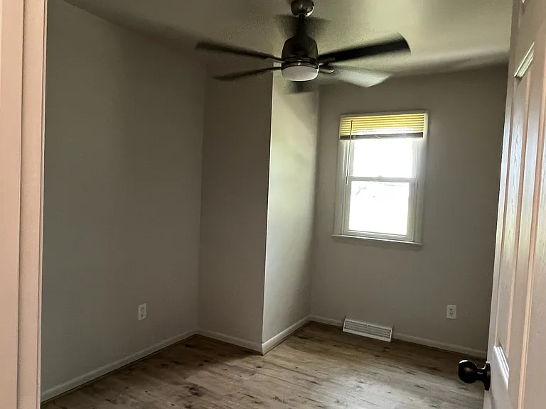 Bedroom 1-- Small bedroom with closet, ceiling fan, will fit twin or bunk beds