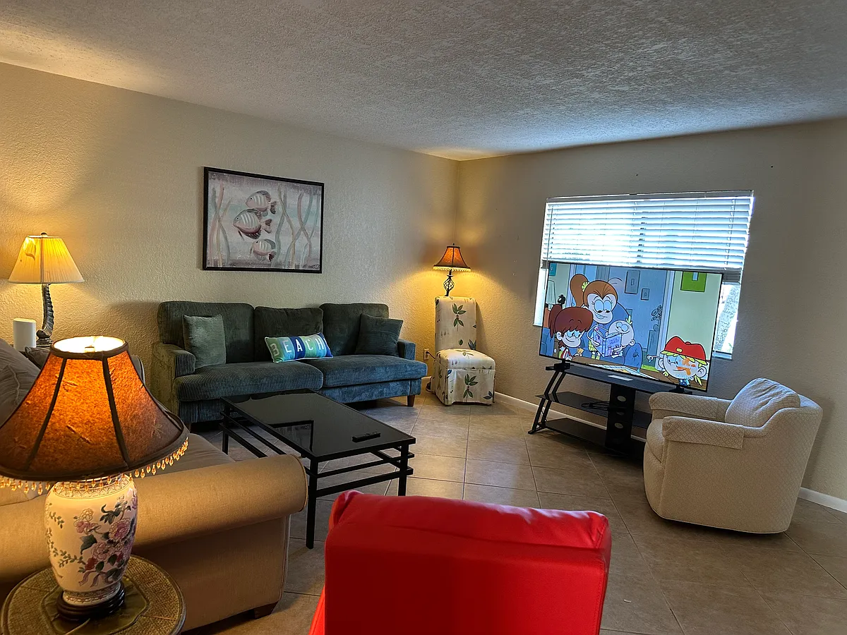 The living room has a new 65 inch smart tv - 4633 Bayshore Dr #3