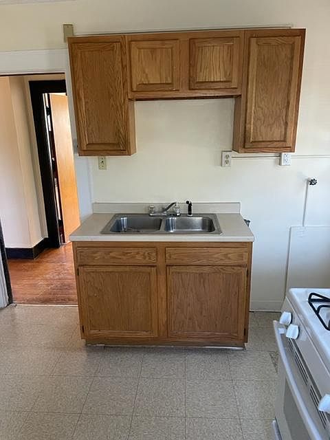 Washing machine hook up next to cabinet
