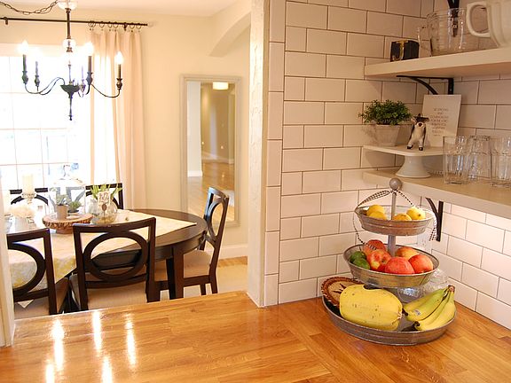 Open into dining room