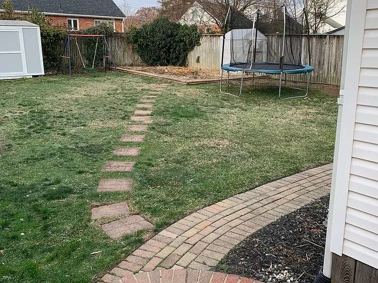 Back yard (two sheds, raised garden, six foot privacy fence)