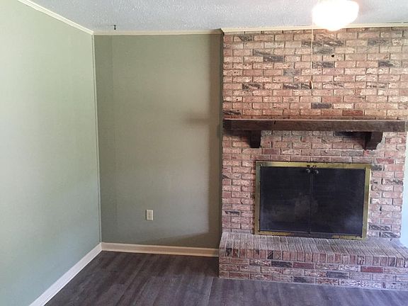 living room w fireplace, new flooring