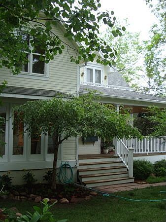 Large Porch with Charming Yard 
