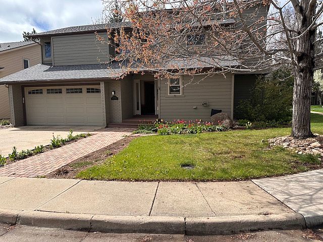 Front of the house with 2 car garage
