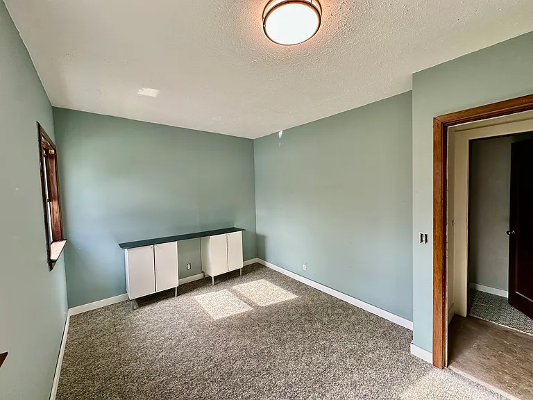 New flooring and paint in 2nd bedroom. 3rd bedroom will be finished very soon.
