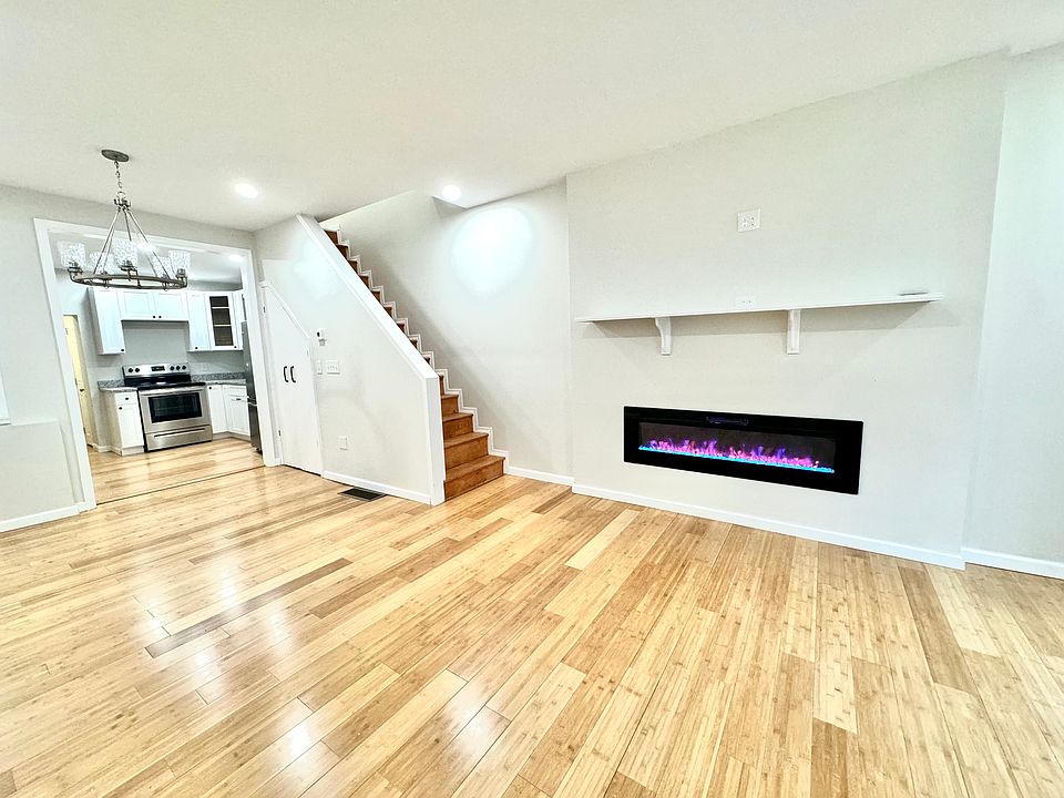 Living room .. fireplace and dining room