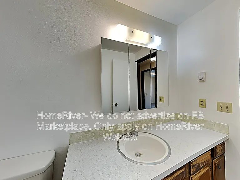 12620 E 31st Ave — Photo 15