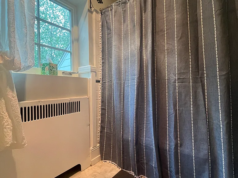 shared bath on the second floor. shower-tub combo