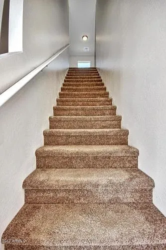 Stair to upper level loft and bedrooms