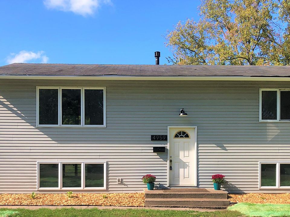 Welcome to bright and spacious, East-facing 4959 Stewart Avenue in White Bear Lake!
