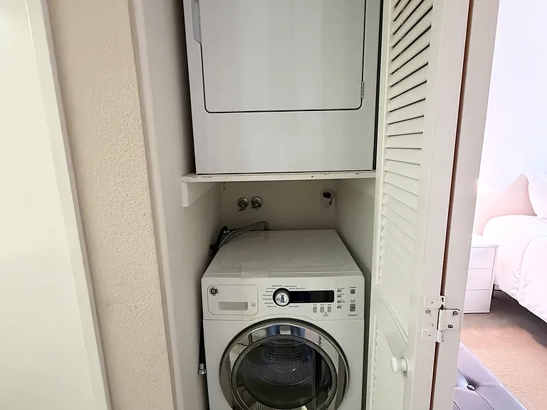 Washer and Dryer closet conveniently located in the bedroom