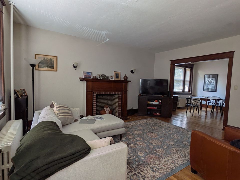 The living room opens directly into the dining room