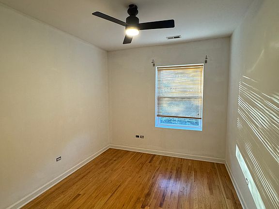 2nd bedroom, which has a full size closet and built in shelves and cabinets for extra storage
