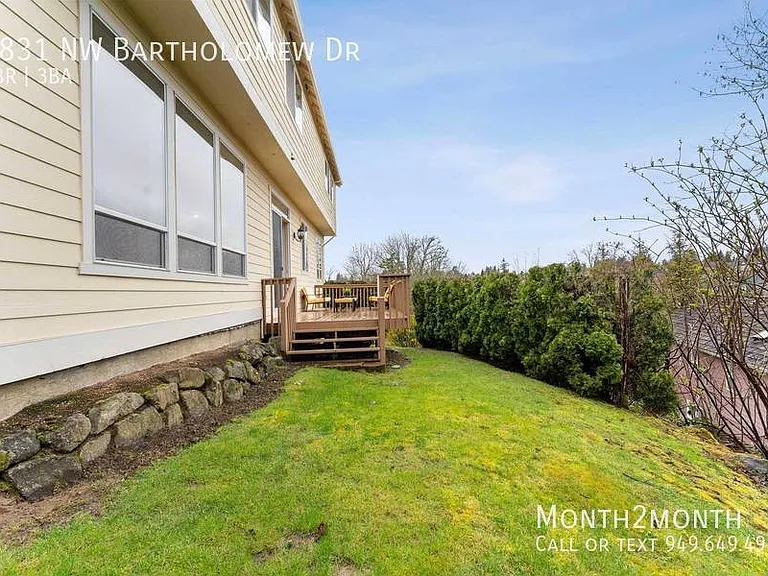 9831 NW Bartholomew Dr — Photo 32