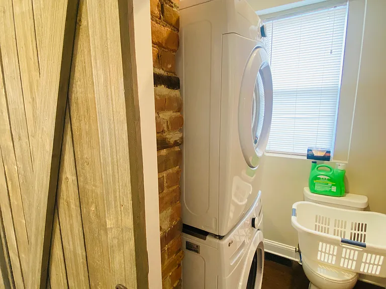 First Floor Half bath with stack washer/ dryer