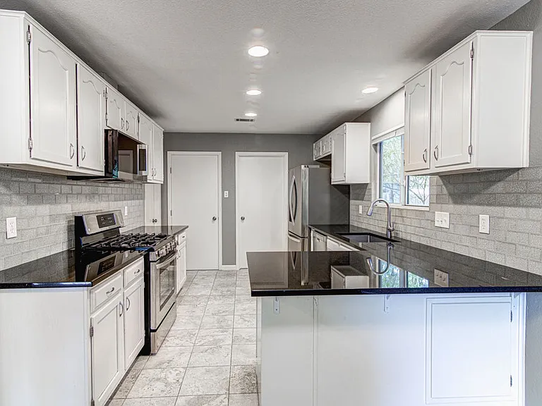 12430 Wycliff Ln — Photo 14