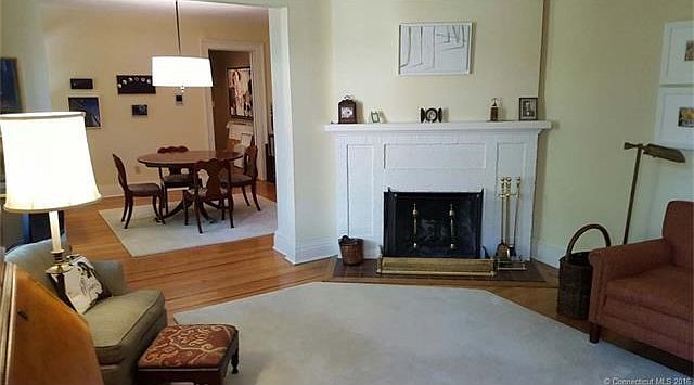 Living room with working fireplace.