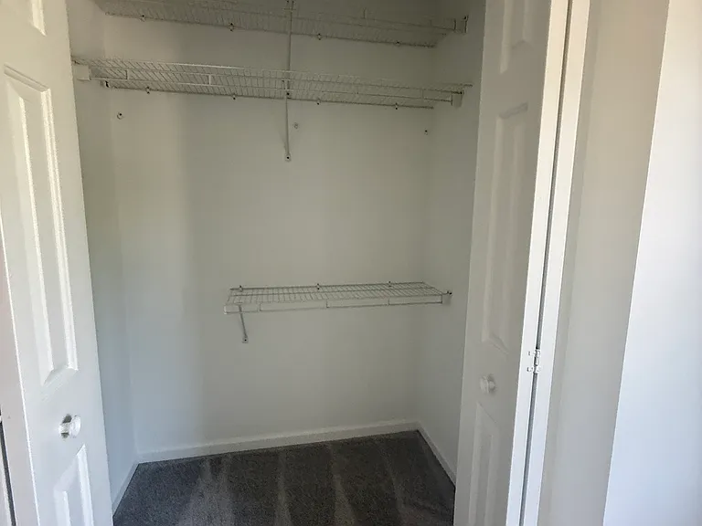 Master bedroom walk in closet 2