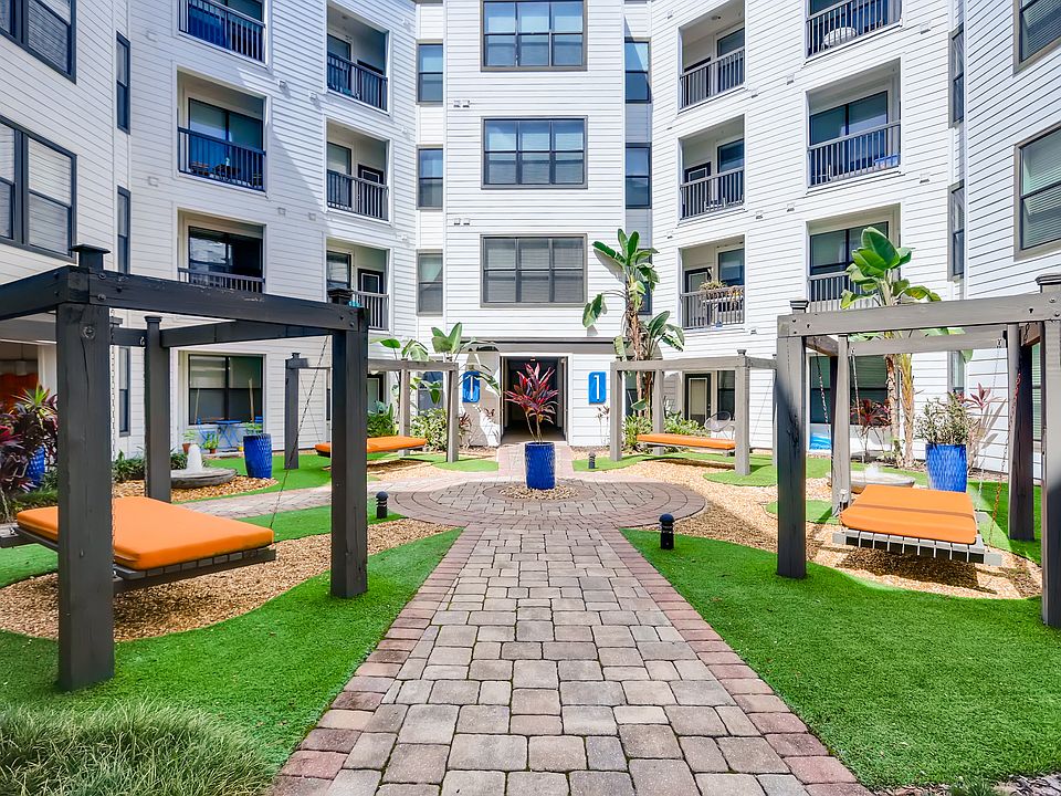 Outdoor lounge area with oversized hammock beds
