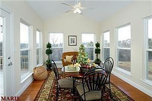 Sunroom w/hardwood flooring